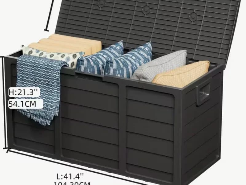 Dark 75 gallon deck box holding patio cushions.